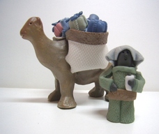 Camello con regalos y paje